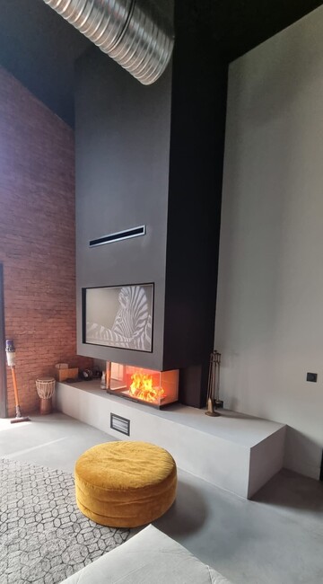 Création d’une cheminée moderne 3 faces dans une magnifique villa contemporaine Création d’une cheminée moderne 3 faces dans une magnifique villa contemporaine