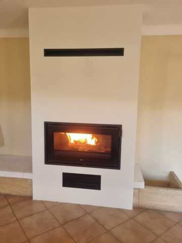 Réhabilitation et transformation d'un foyer ouvert