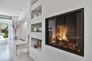 Tendances déco 2025 : les plus belles cheminées modernes pour un intérieur chaleureux et design